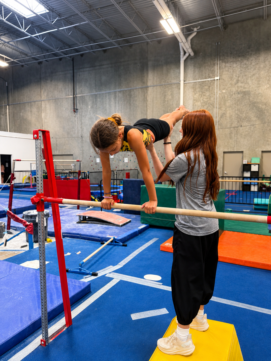 Gymnast training on the balance beam at High Altitude Tumbling in Provo